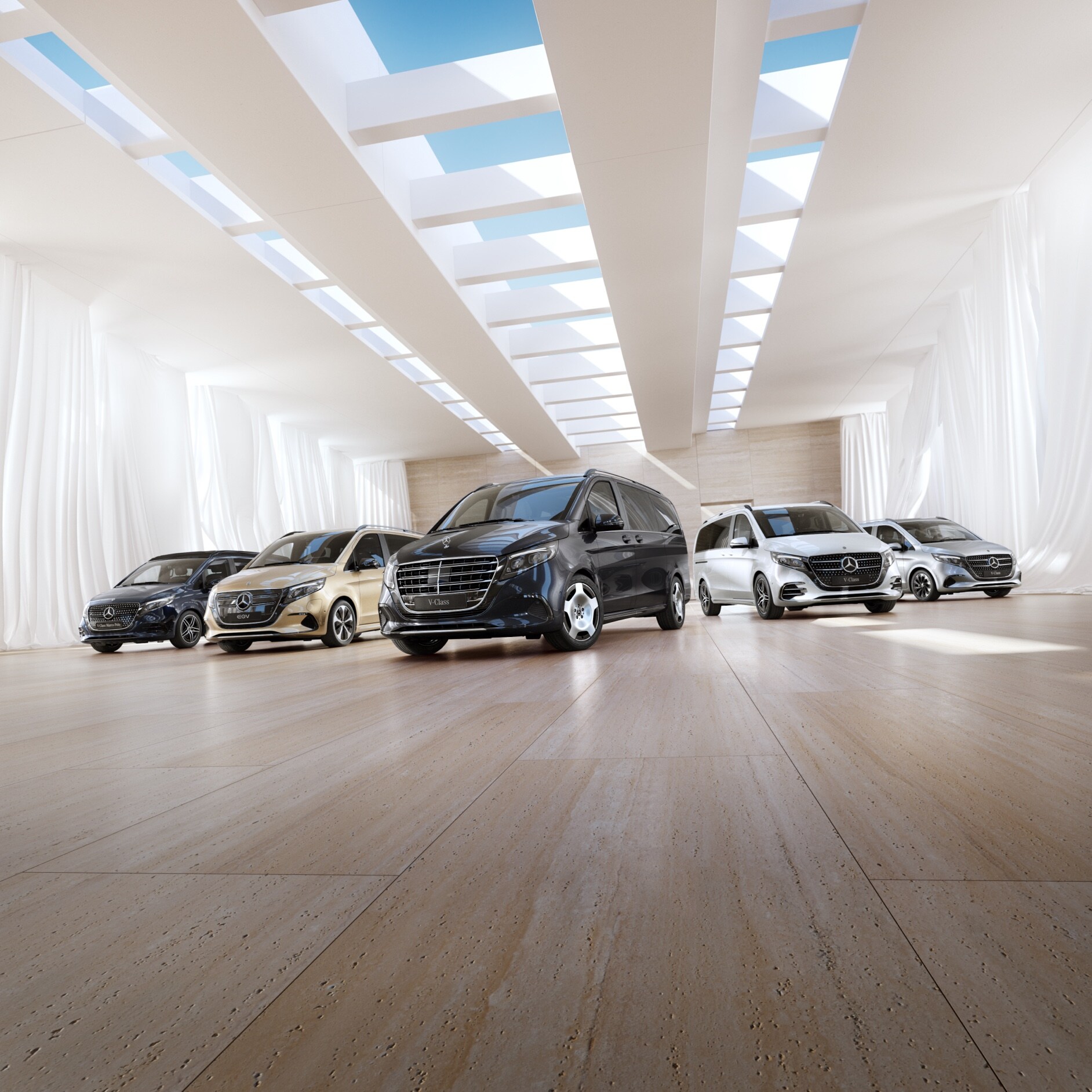 Komfort | EQV | Mercedes-Benz Vans Die Mercedes-Benz Van und Camper Modelle stehen in einem Showroom.